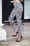 White Zebra Print High Rise Skinny Jeggings